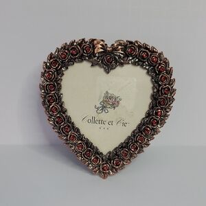 Heart-Shaped Bronze Frame with Red Accents